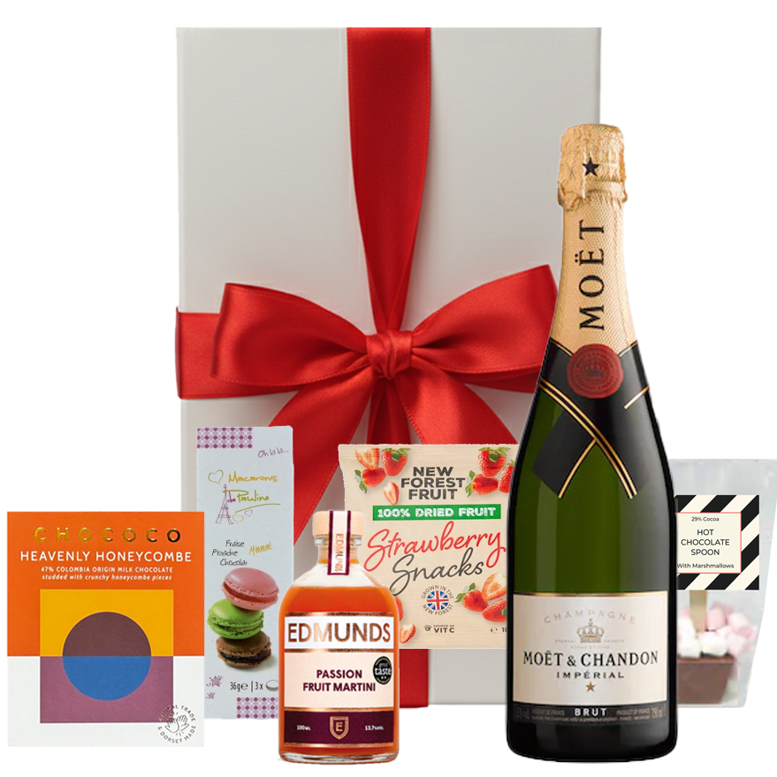 Moët & Chandon Christmas hamper with festive treats in a white gift box with bow