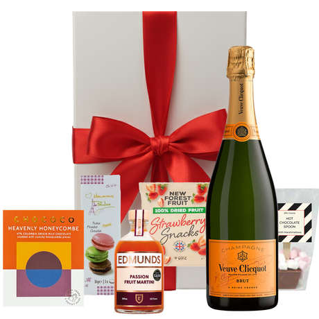 Veuve Clicquot Christmas hamper with festive treats in a white gift box with bow