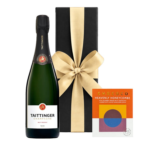 Taittinger Brut Réserve Champagne with a Chococo Heavenly Honeycombe milk chocolate bar in a black gift box with hand-tied ribbon.