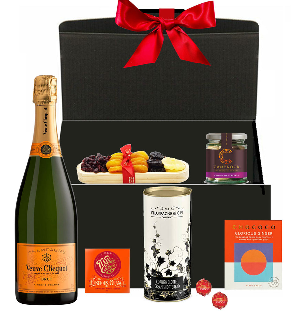 Veuve Clicquot Christmas hamper with festive chocolates and treats in a luxury gift box with bow