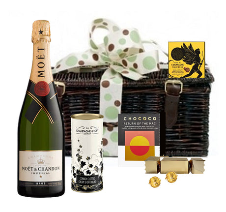 Moët Champagne hamper with artisan chocolates in a bronzed wicker basket with ribbon
