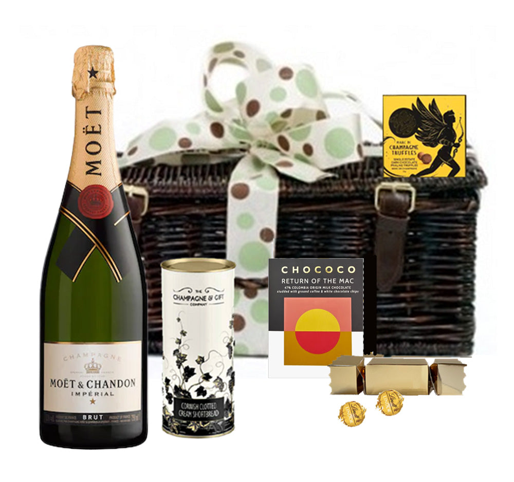 Moët Champagne hamper with artisan chocolates in a bronzed wicker basket with ribbon